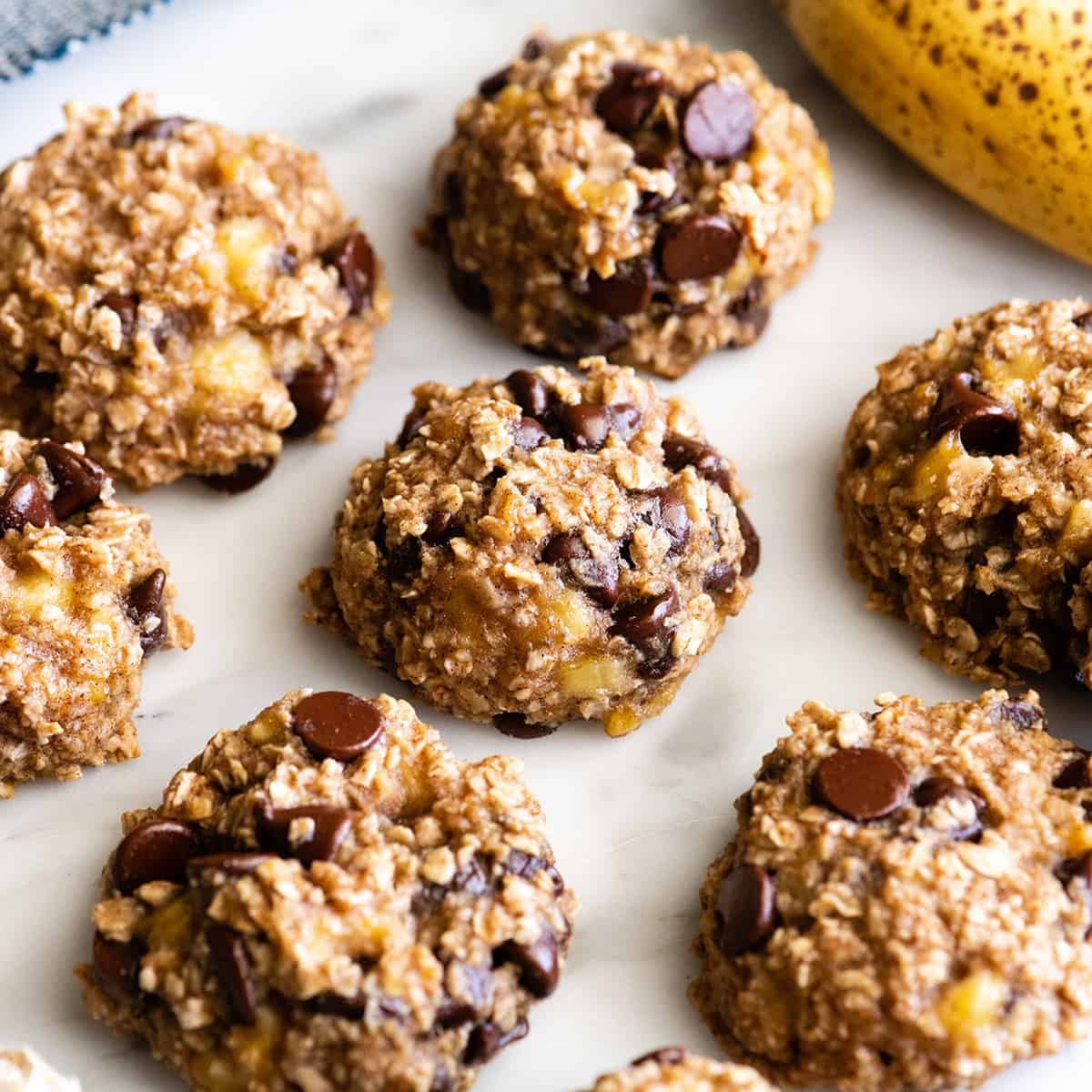 These banana oatmeal cookies are easy to make with a few simple ingredients in 20 minutes. Banana oat cookies are a delicious breakfast, snack or healthy dessert - add chocolate chip or your favorite mix-ins to make them extra-special! 6 Banana Oatmeal Cookies