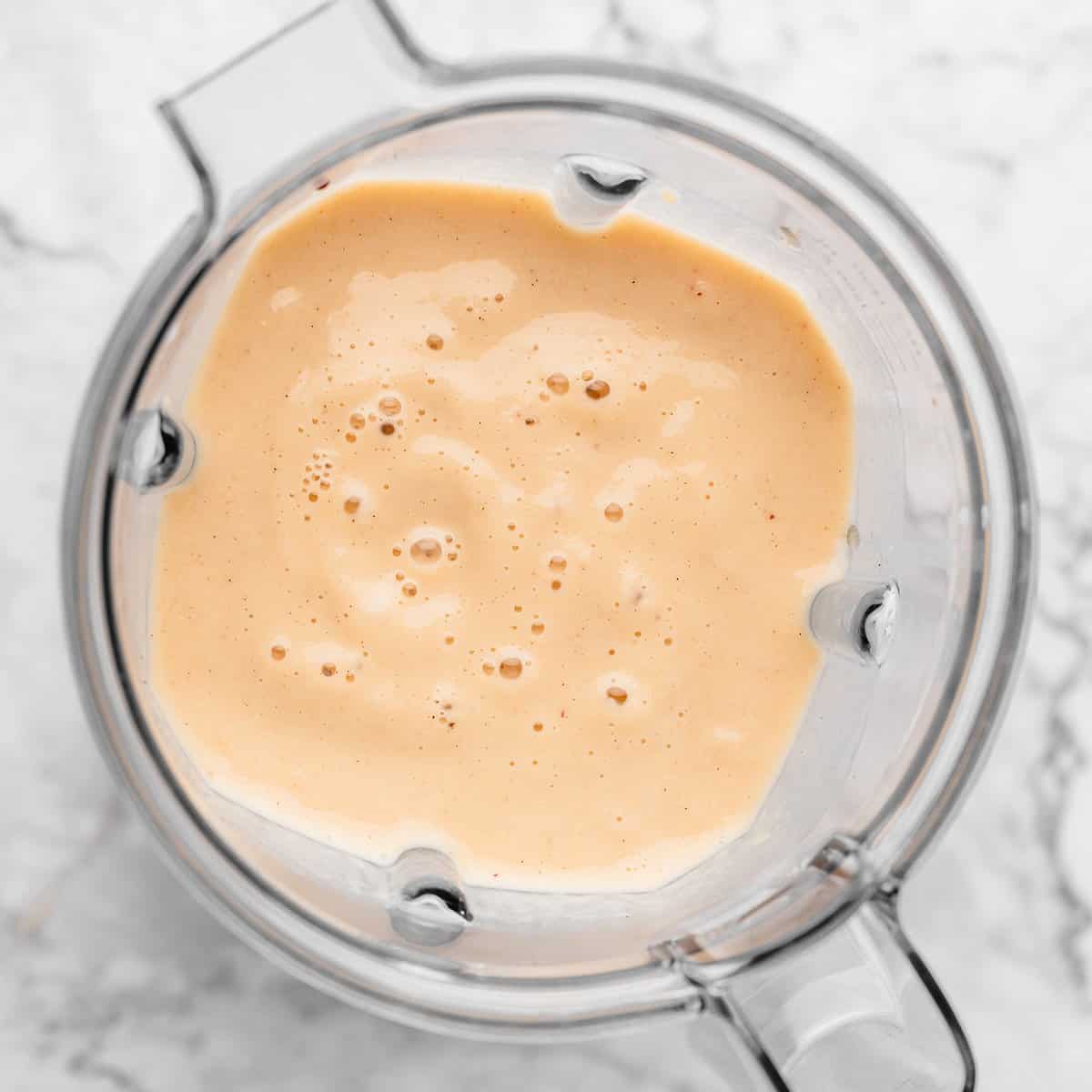 Banana Peach Smoothie Recipe in a blending container after blending