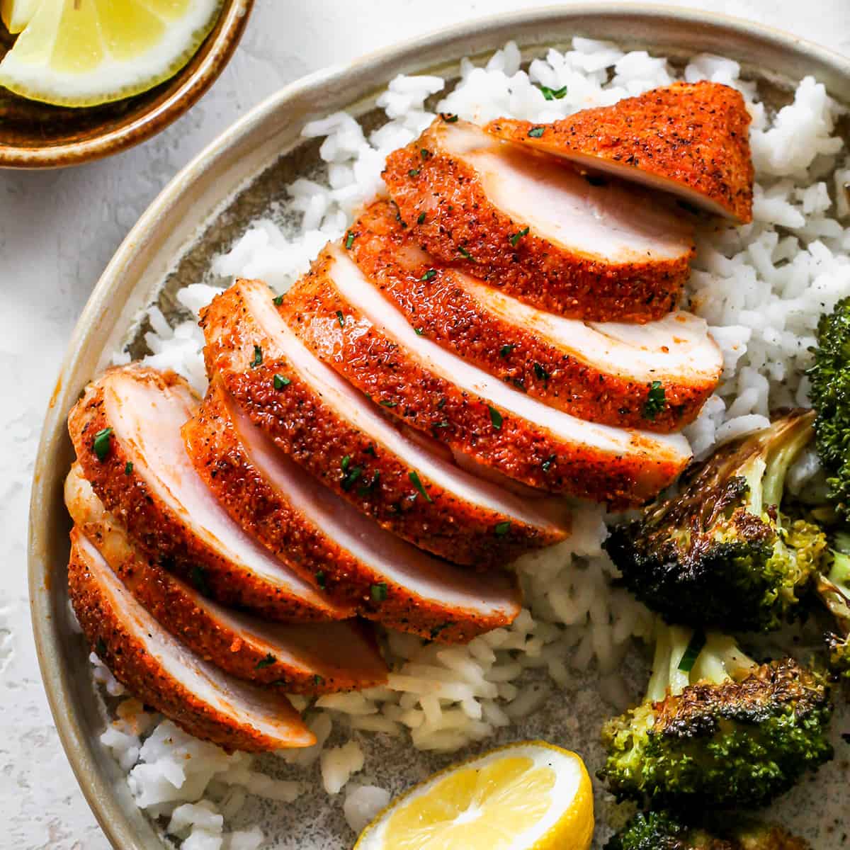 Baked Chicken Breast Recipes - baked chicken breast sliced over rice