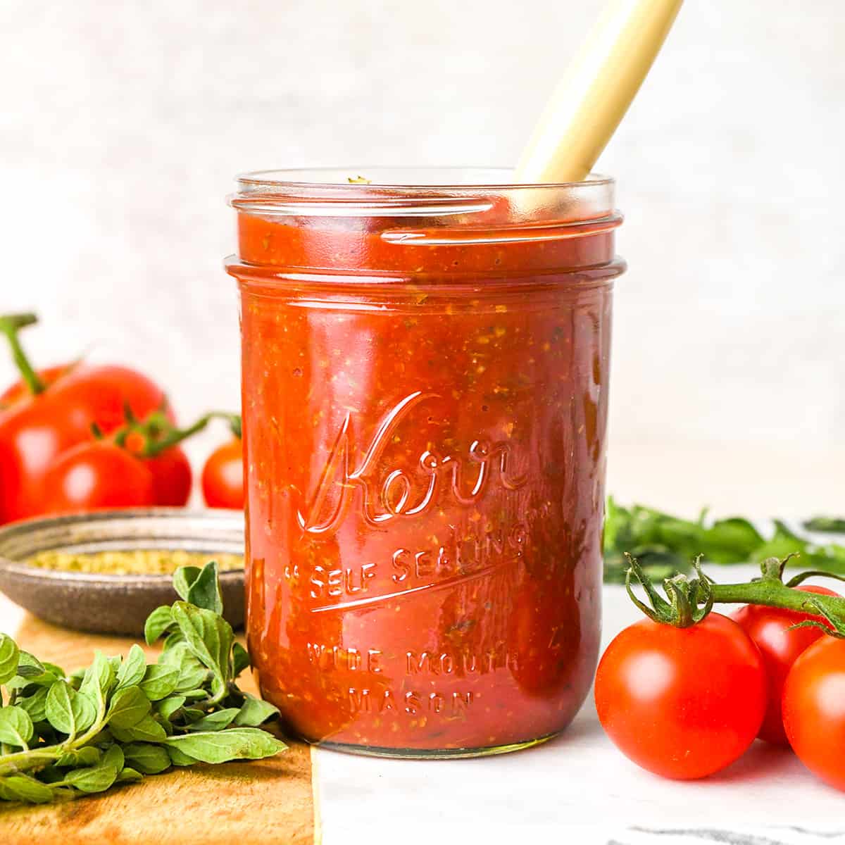 a glass jar of pizza sauce