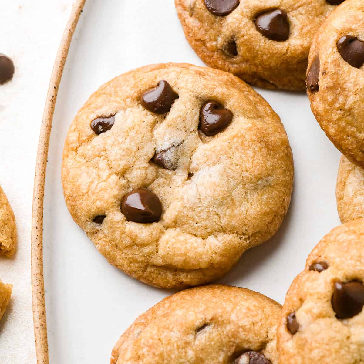 6 Vegan Chocolate Chip Cookies on a plate