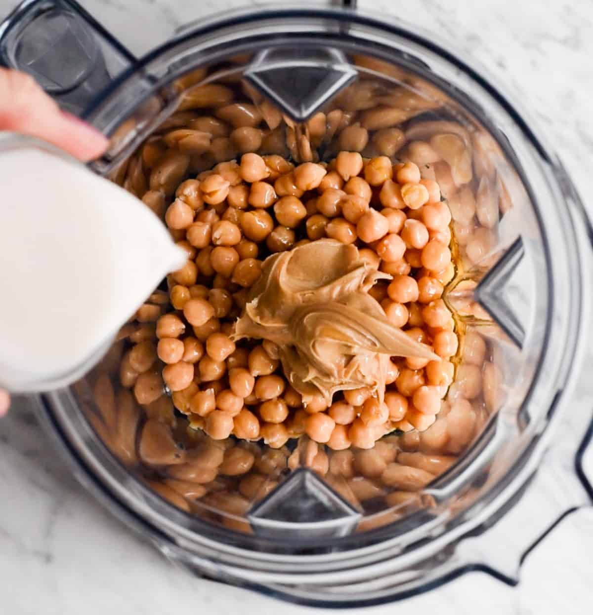 How to Make Chocolate Hummus - adding ingredients to the blending container before blending