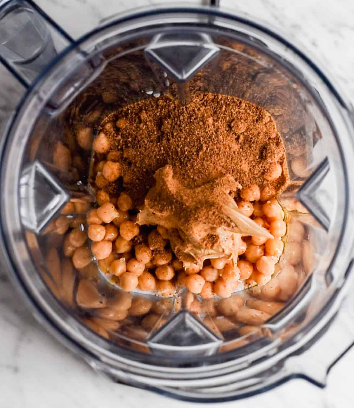 How to Make Chocolate Hummus - adding ingredients to the blending container before blending