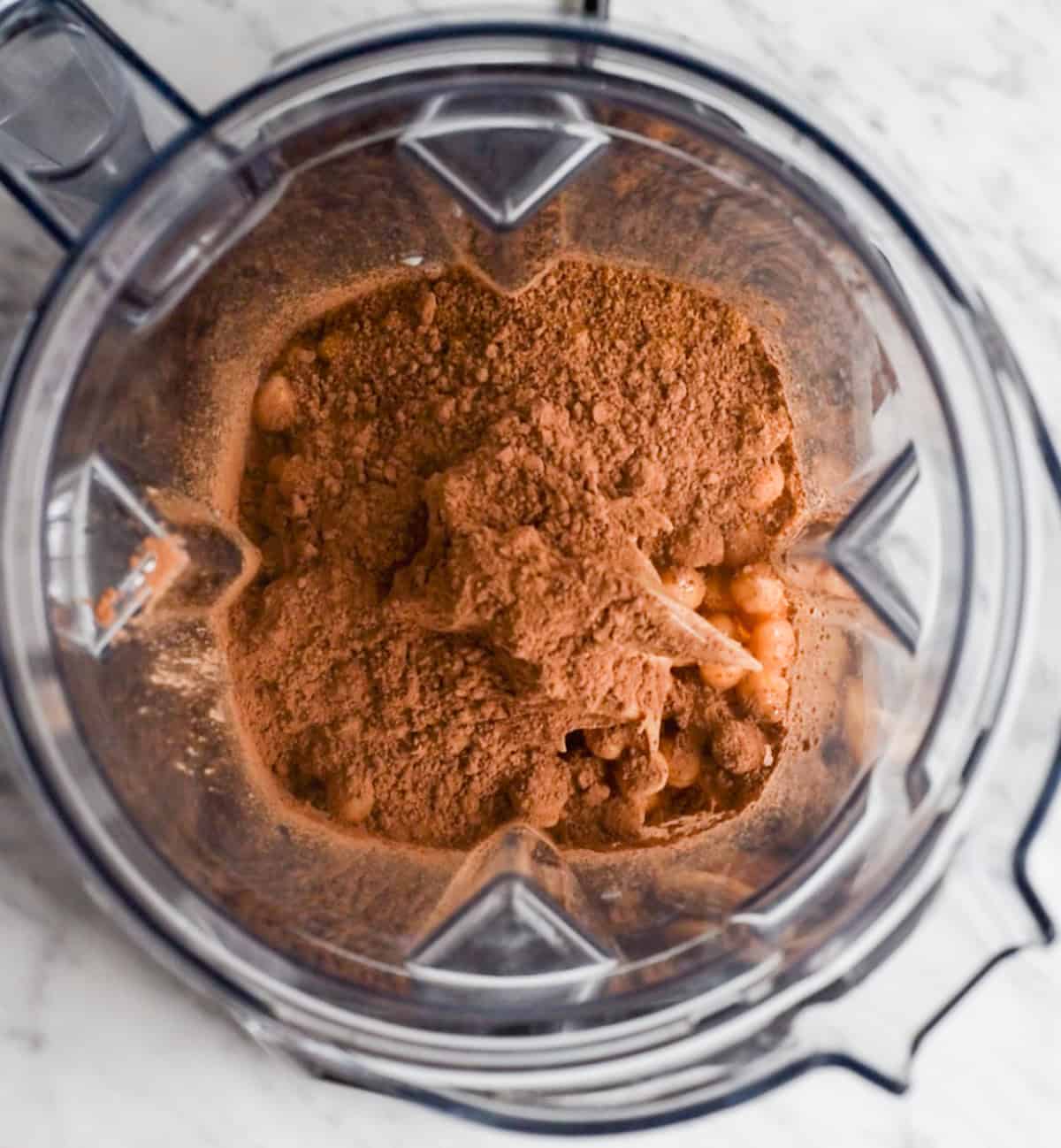 How to Make Chocolate Hummus - adding ingredients to the blending container before blending