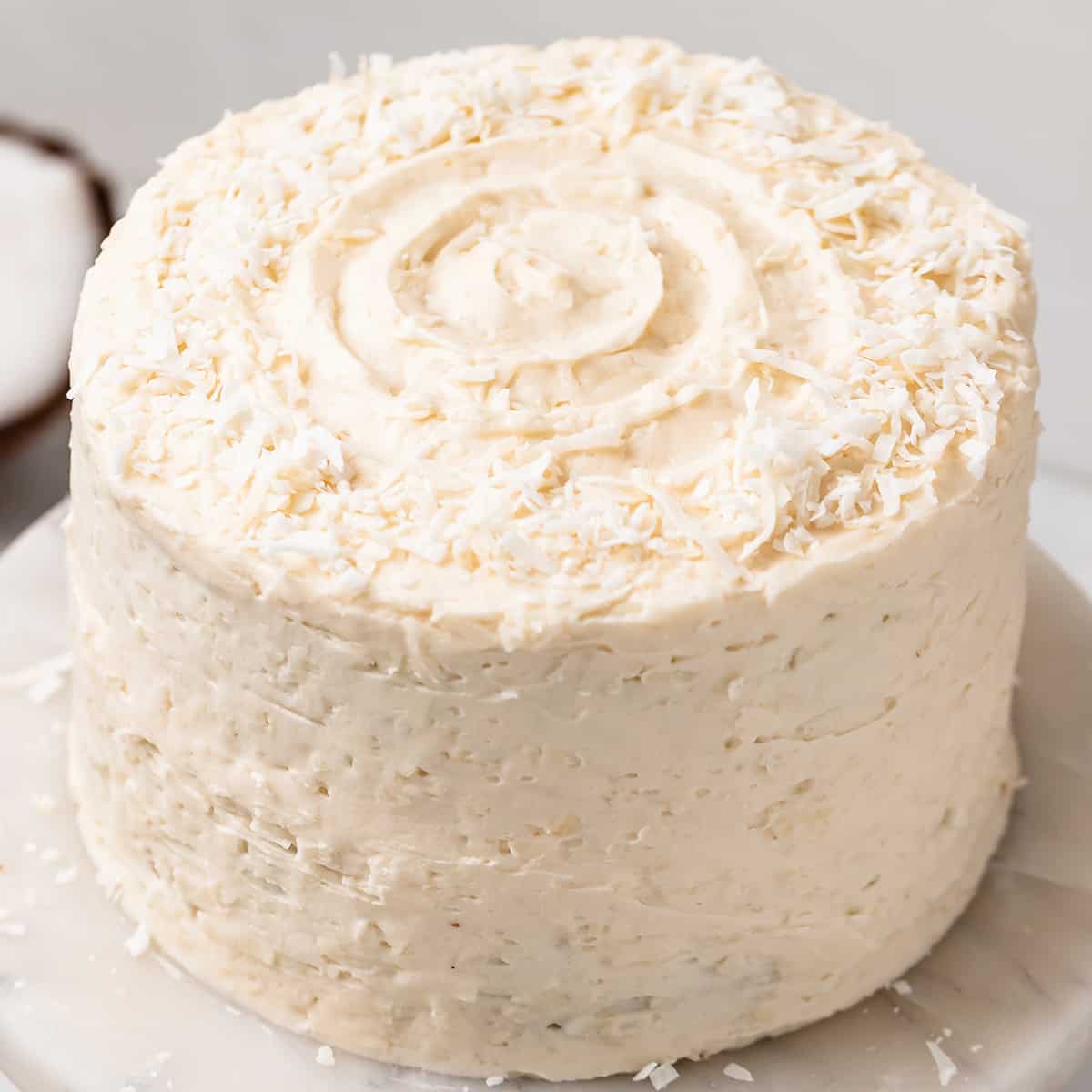 Coconut Frosting spread onto a cake