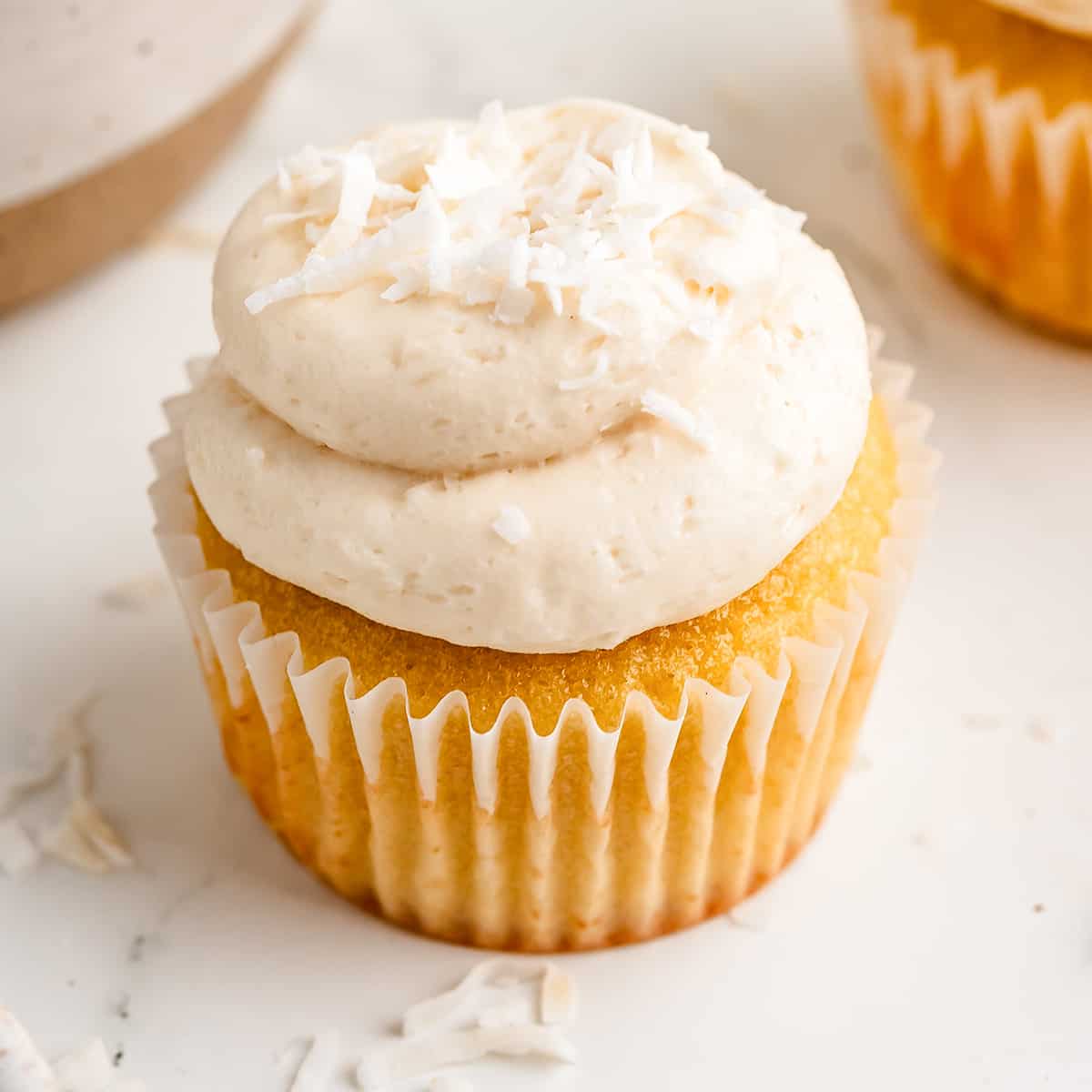 Coconut Frosting on top of a cupcake