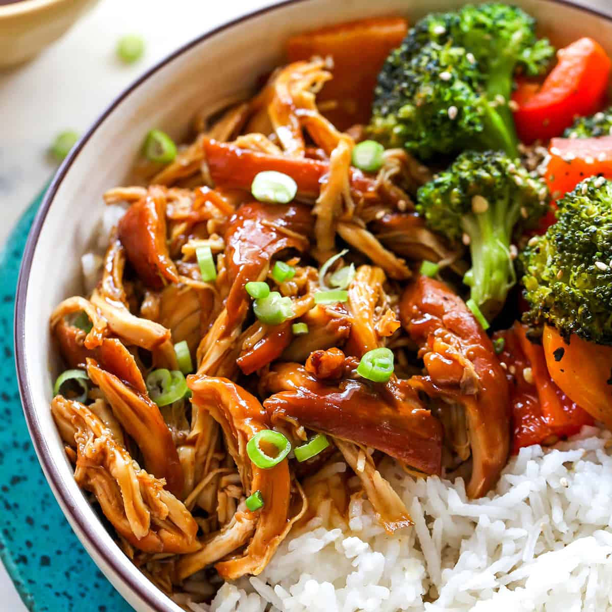 Crock Pot Teriyaki Chicken in a bowl with rice and vegetables