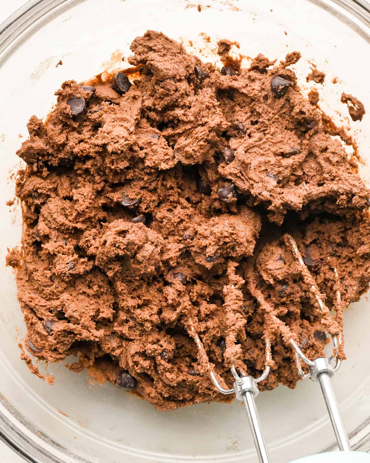 chocolate cookie bars dough after mixing in chocolate chips