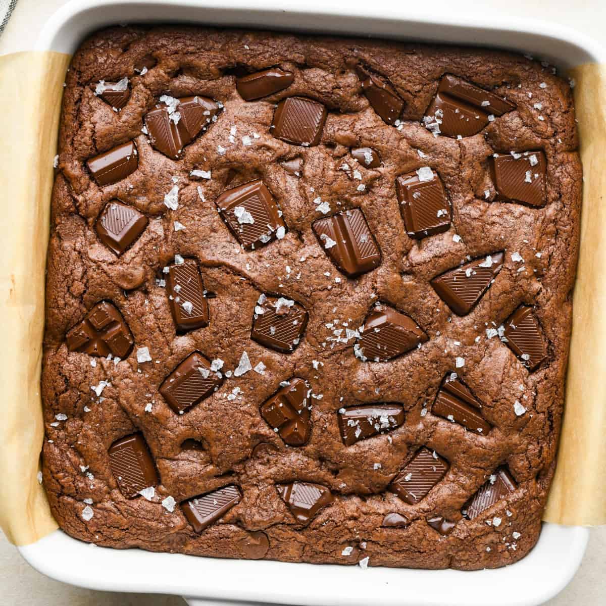 Double Chocolate Cookie Bars in a baking dish topped with flaky sea salt