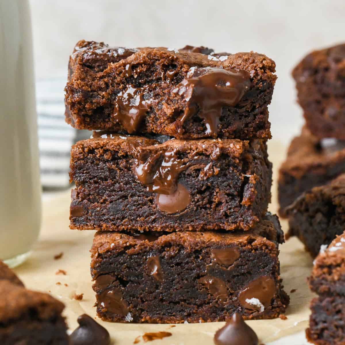 a stack of 3 Double Chocolate Cookie Bars, the top one with a bite taken out of it