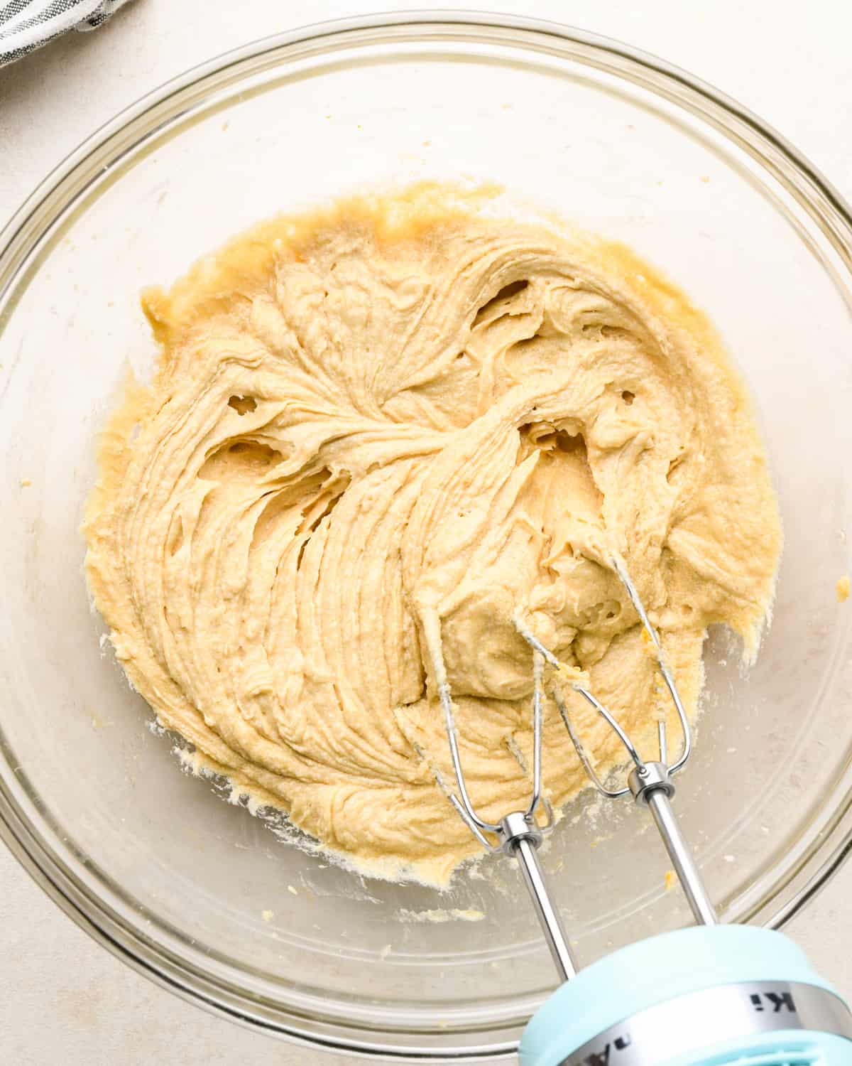 how to make chocolate cookie bars - batter after beating in egg and vanilla