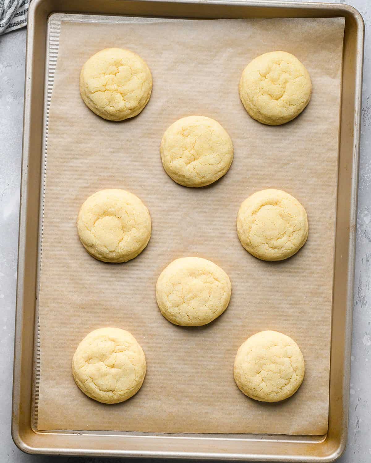 8 Easy Sugar Cookies on a baking sheet after baking