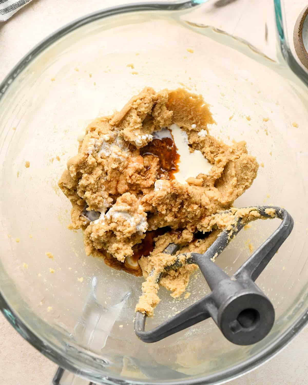 How to Make Eggless Chocolate Chip Cookies - adding cream and vanilla before beating