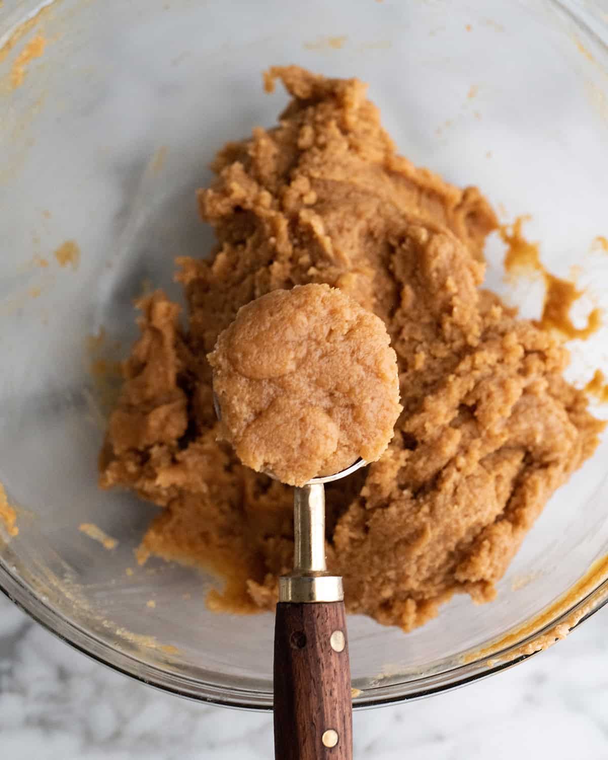 These Flourless Peanut Butter Cookies are easy to make with 4 ingredients in 15 minutes! These gluten-free peanut butter cookies are so good no one can tell they're made without flour or butter!
