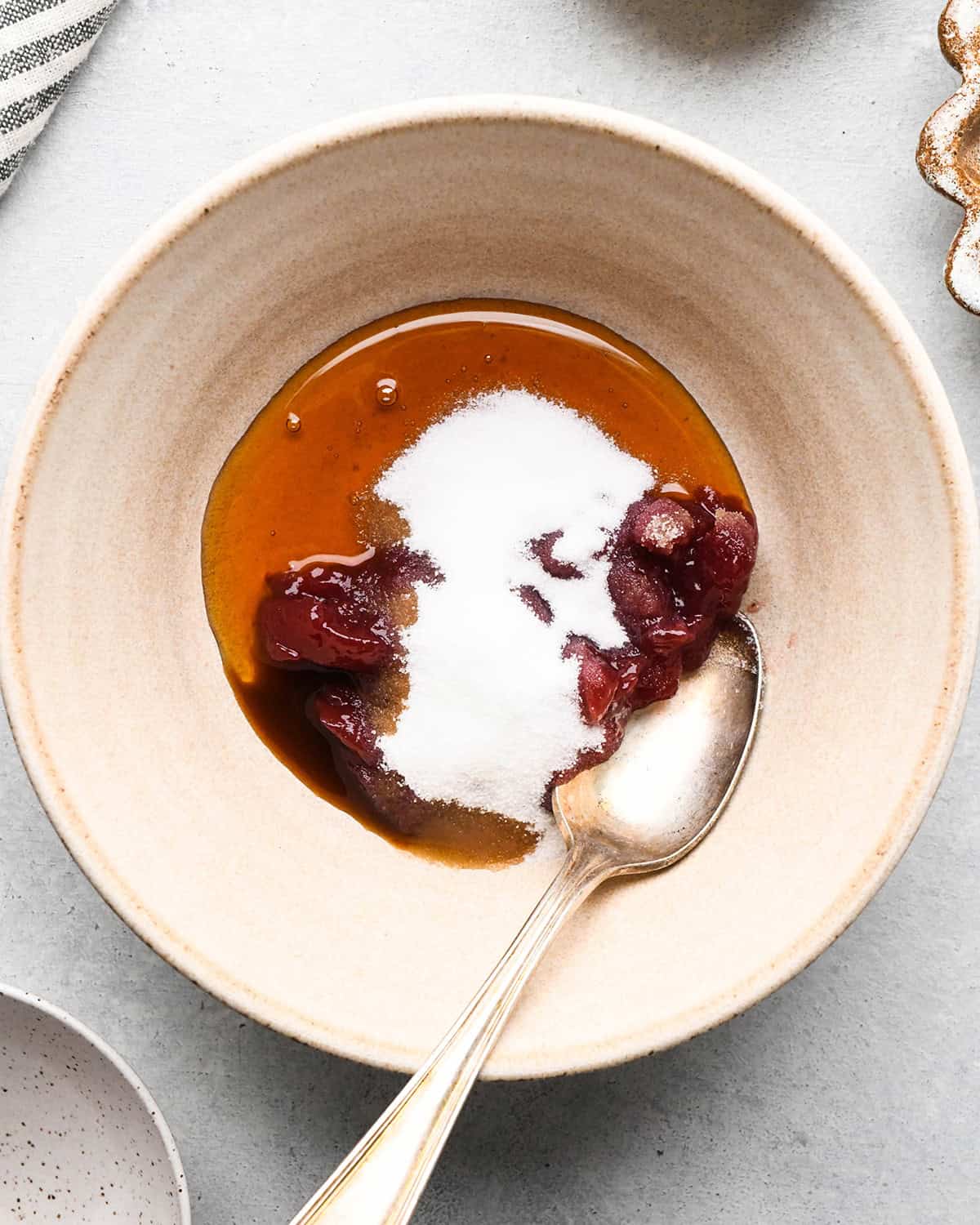 making fruit salsa - jam honey and sugar in a bowl before mixing