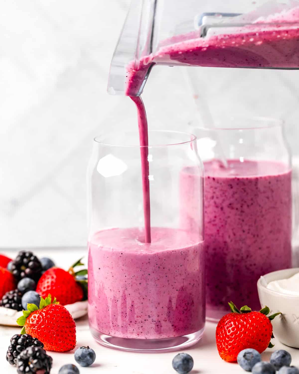 Greek Yogurt Smoothie being poured into a glass cup