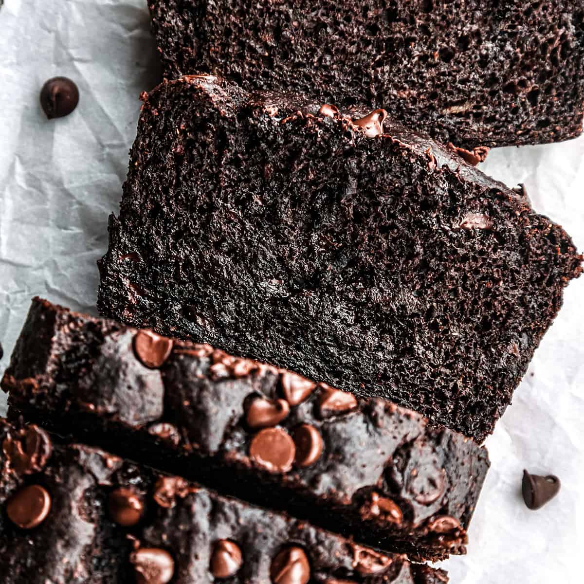 3 slices of Healthy Chocolate Banana Bread cut out of a loaf