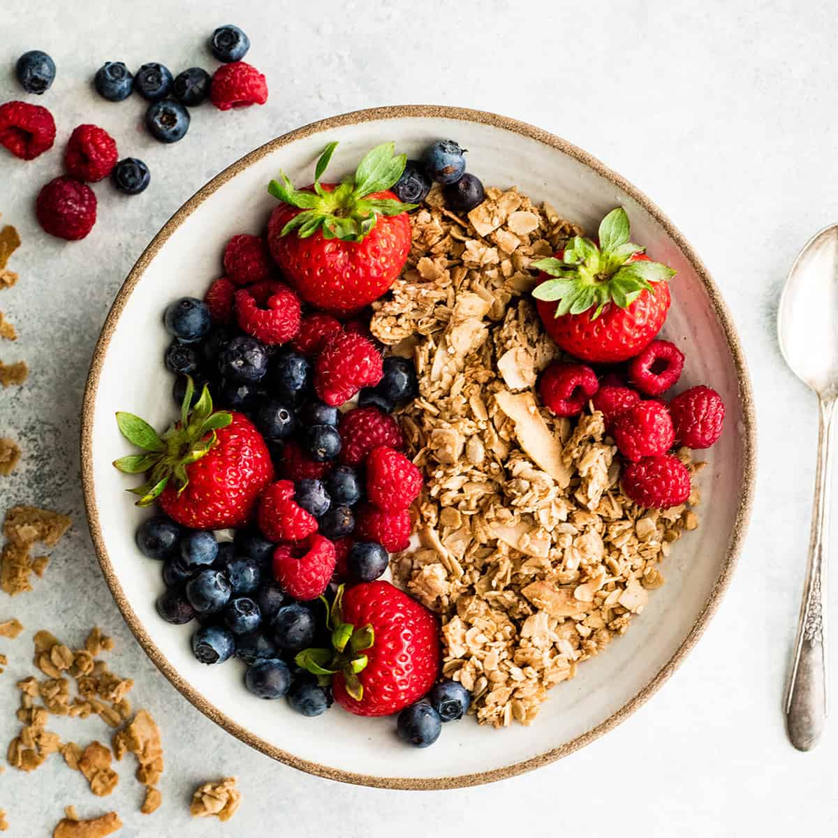 a bowl of Healthy Homemade Granola with berries