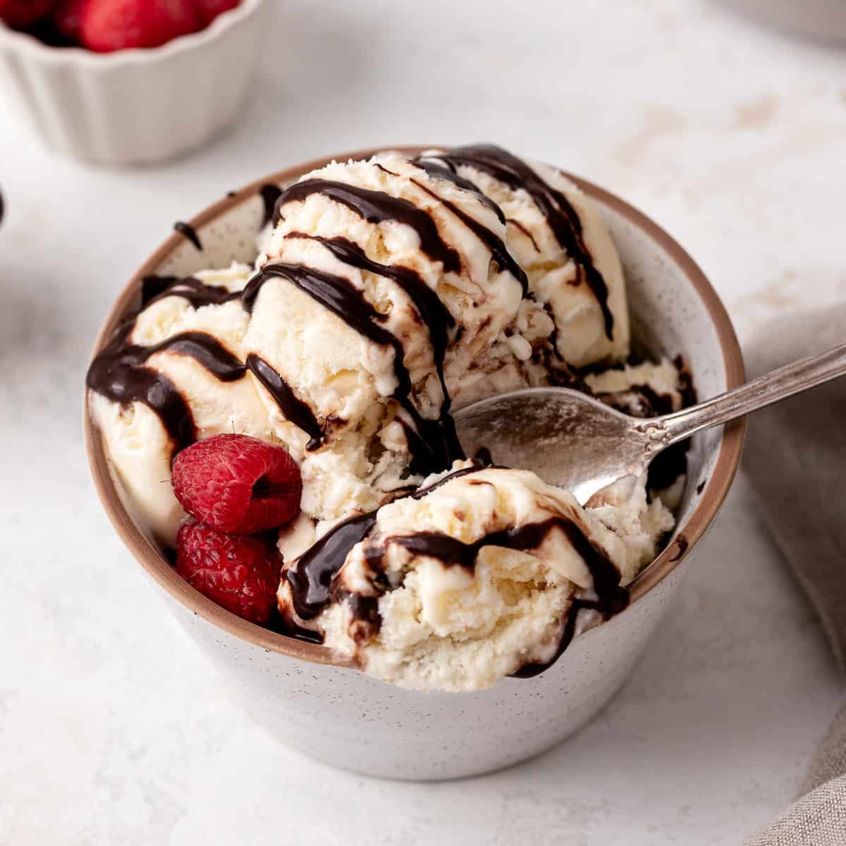 Chocolate Sauce drizzled on top of vanilla ice cream