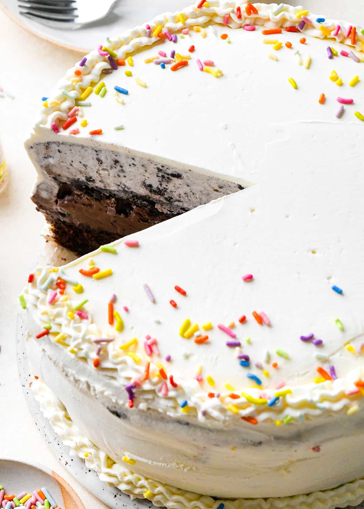 an ice cream cake with a slice cut out of it