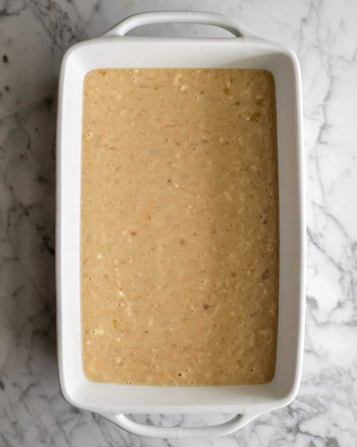 How to Make Banana Cake - batter in a cake pan before baking