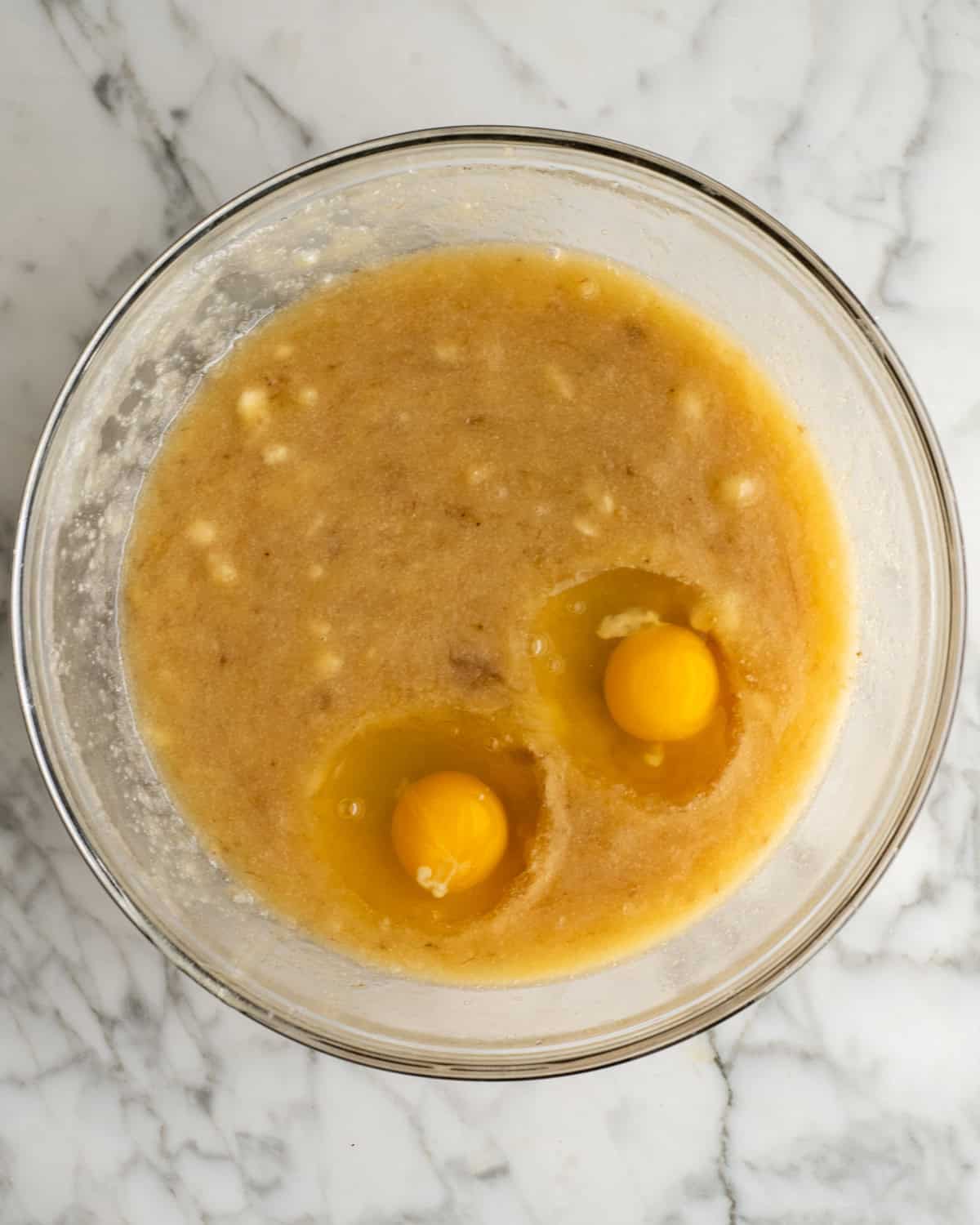 How to Make Banana Cake - eggs added to the batter before stirring