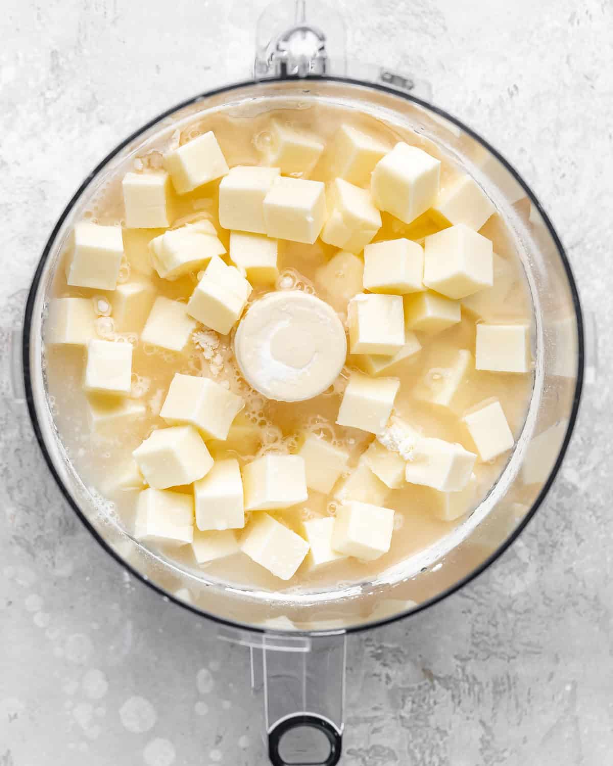 How to Make Blueberry Pie Crust - butter and water added before mixing