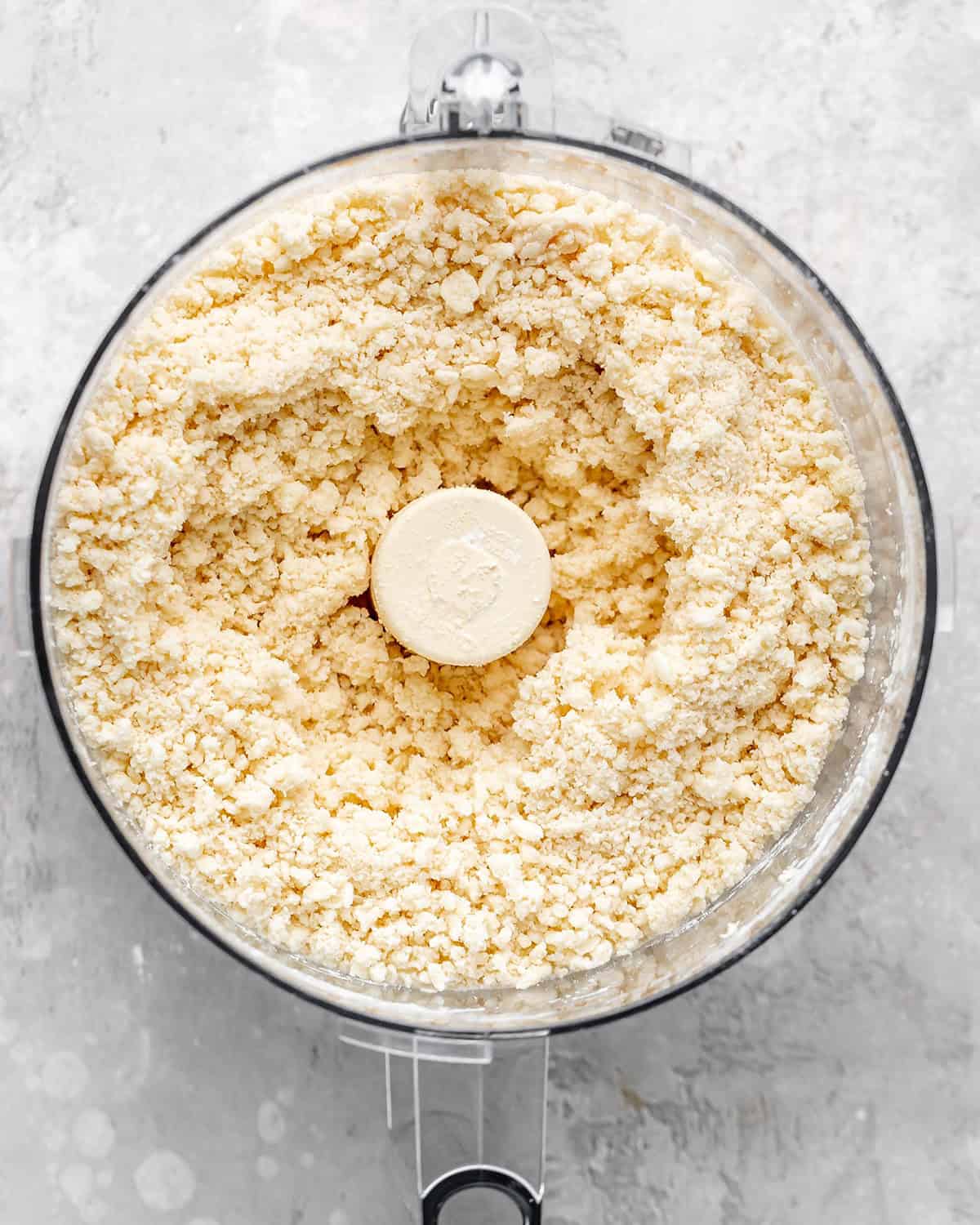 How to Make Blueberry Pie Crust - final crust mixture in a food processor