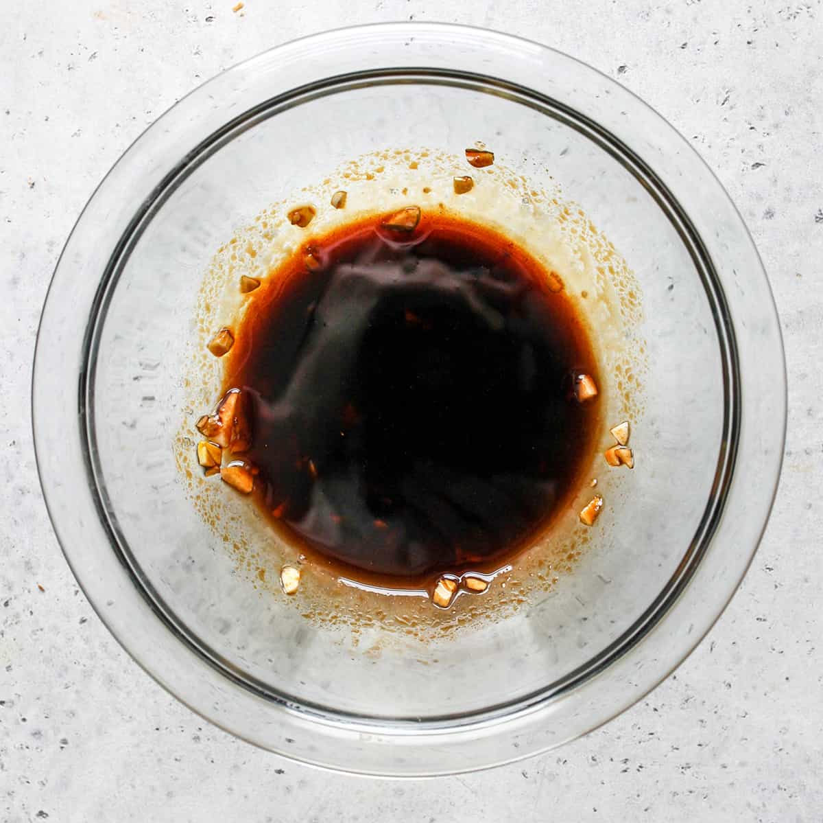 a bowl of dressing or this tomato bruschetta recipe