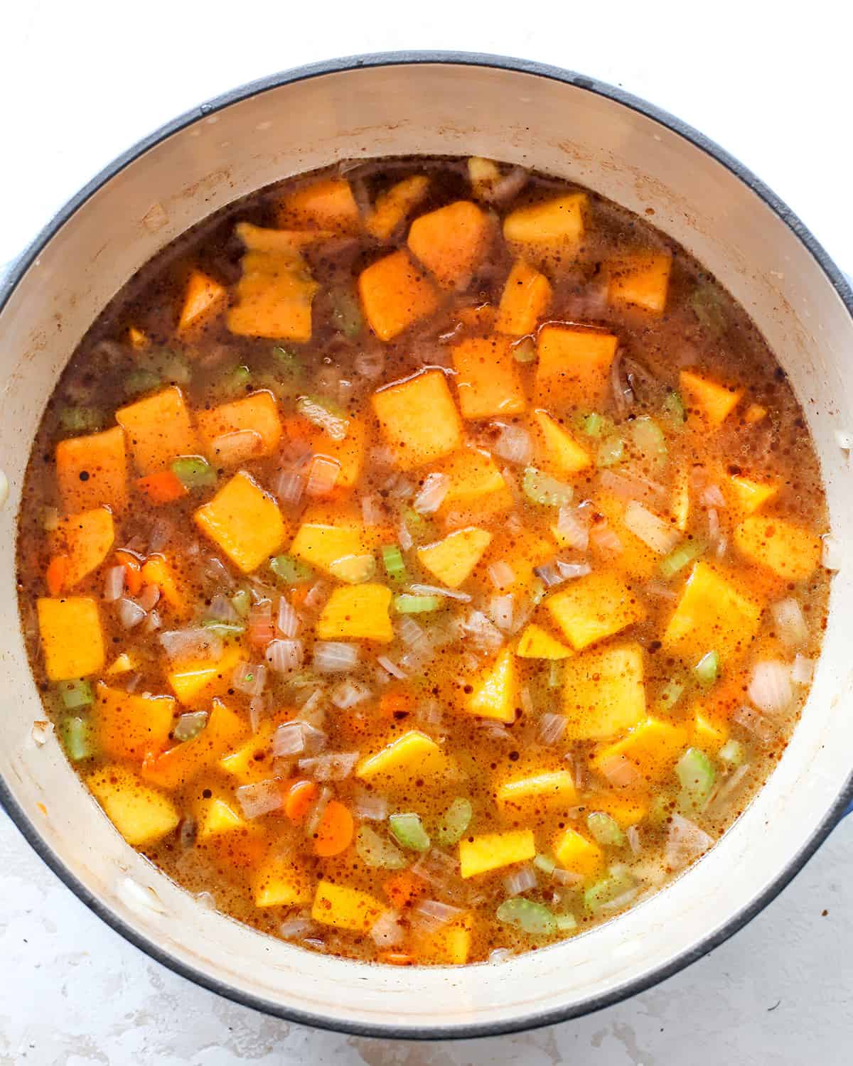 How to Make Butternut Squash Soup - adding squash and other ingredients after stirring