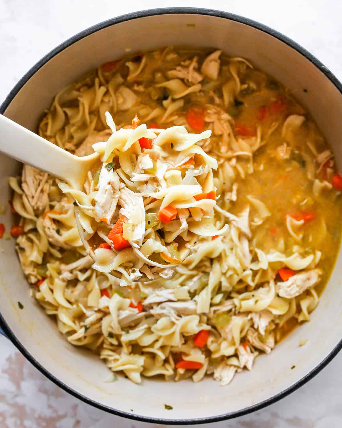 final chicken noodle soup mixture after noodles are cooked