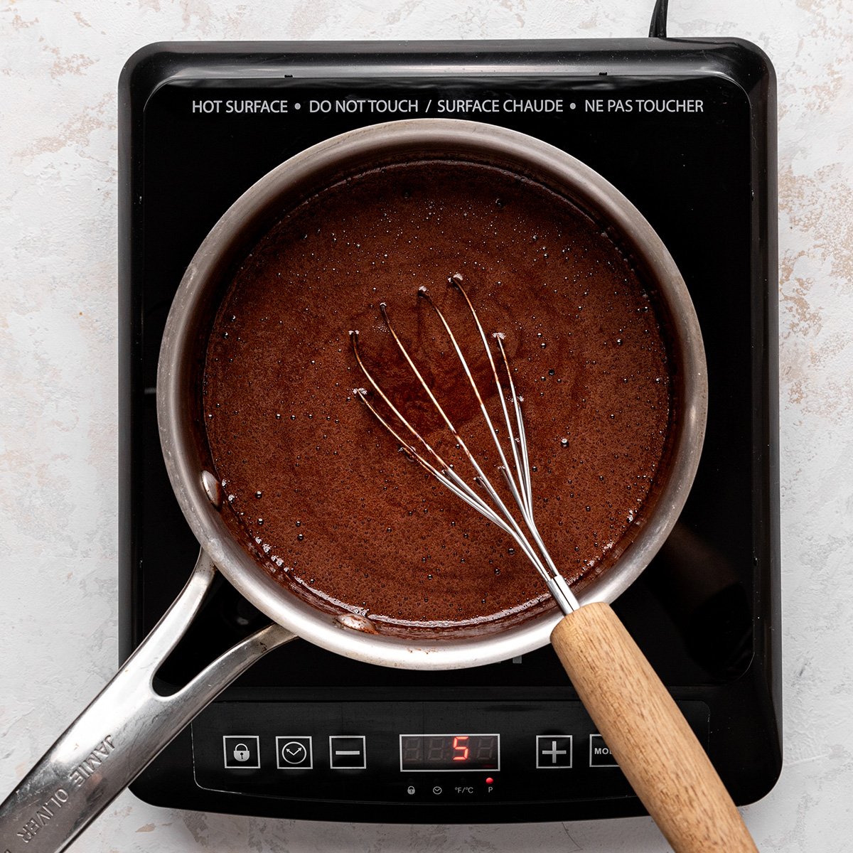 How to Make Chocolate Sauce - whisking mixture until smooth