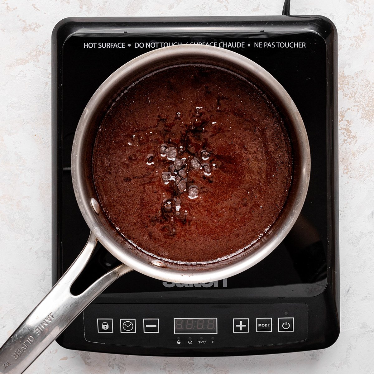 How to Make Chocolate Sauce - adding vanilla and chocolate