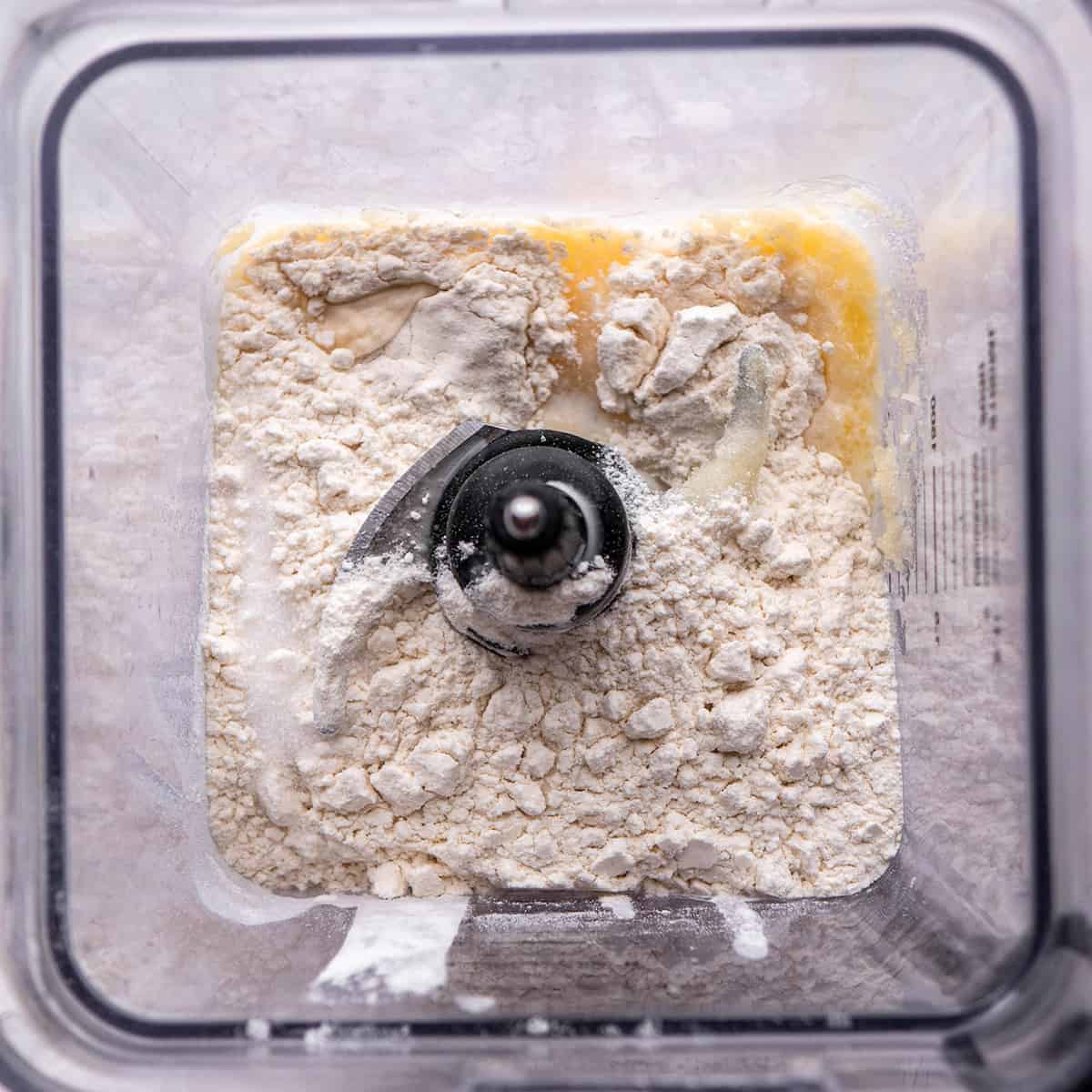 a photo showing How to Make Crepes in a blender - ingredients before blending