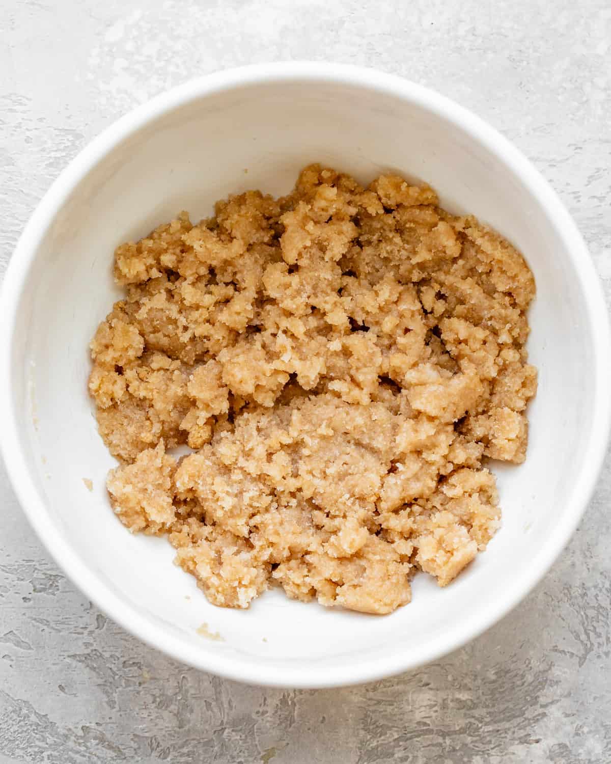 making Dairy Free Chocolate Chip Cookies - coconut oil and sugars in a bowl after beating