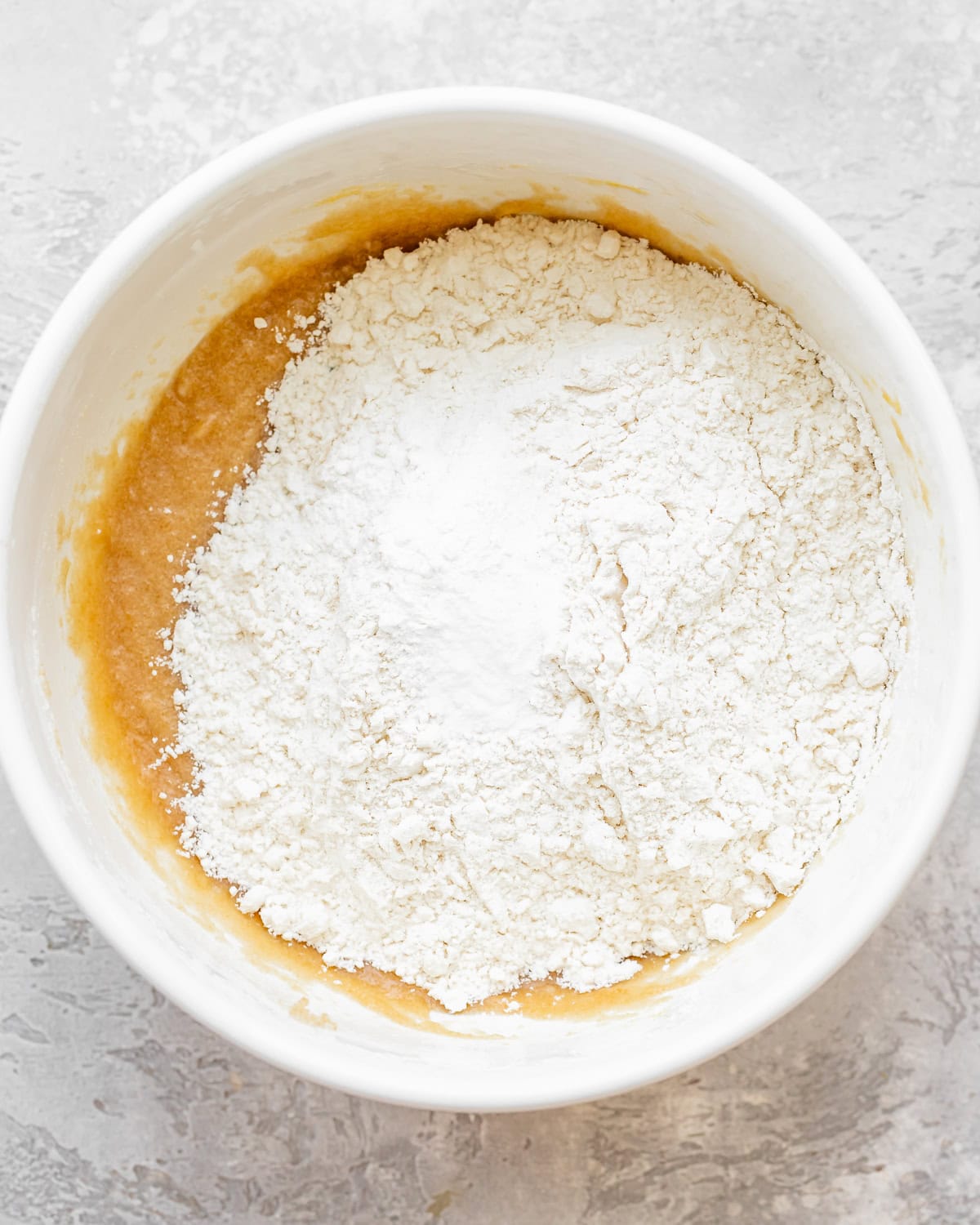 making Dairy Free Chocolate Chip Cookies - adding dry ingredients before beating