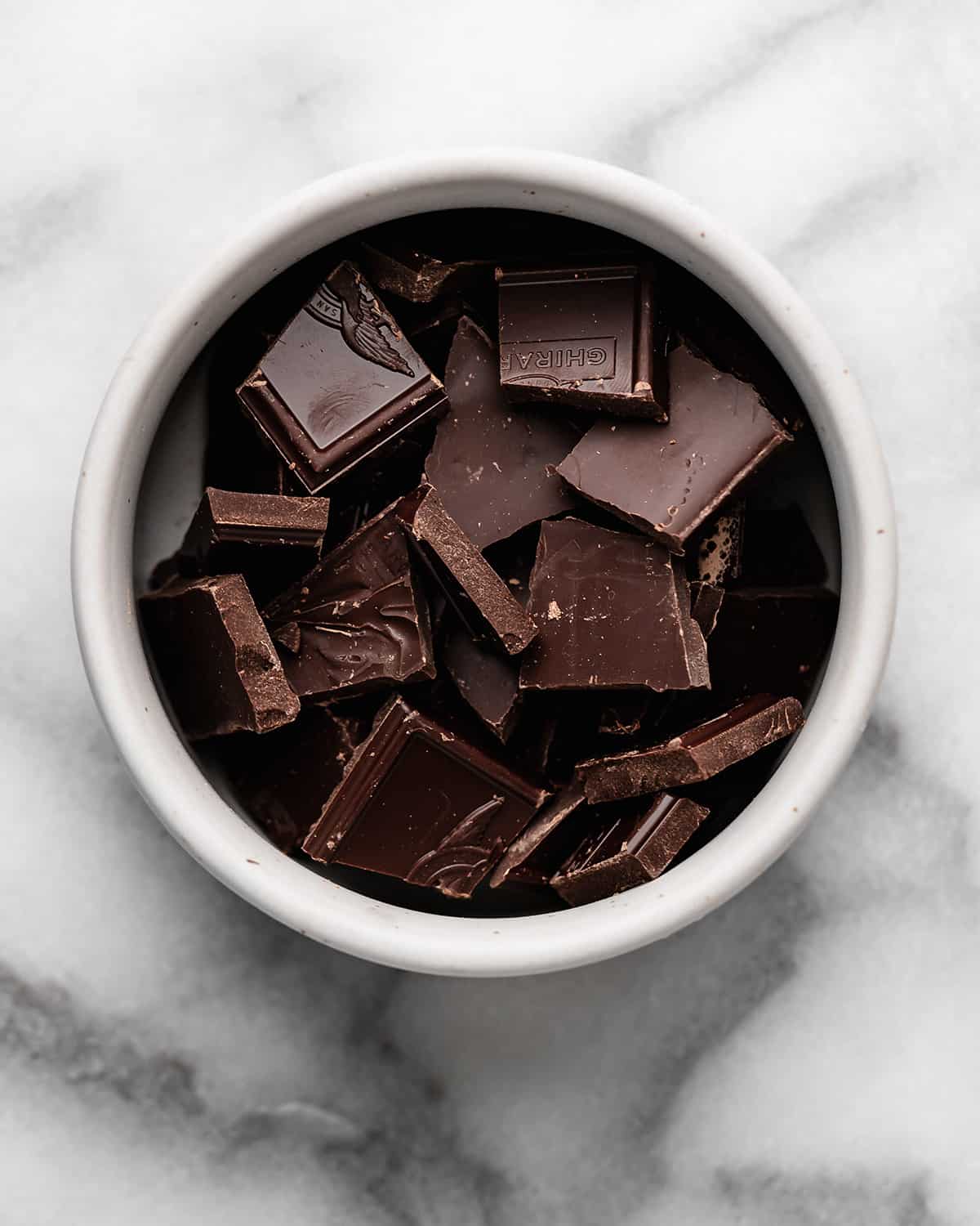 chocolate pieces in a bowl before melting