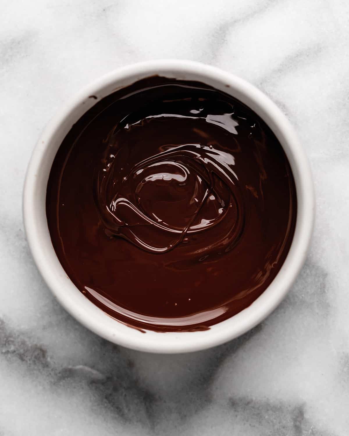 chocolate pieces in a bowl after melting