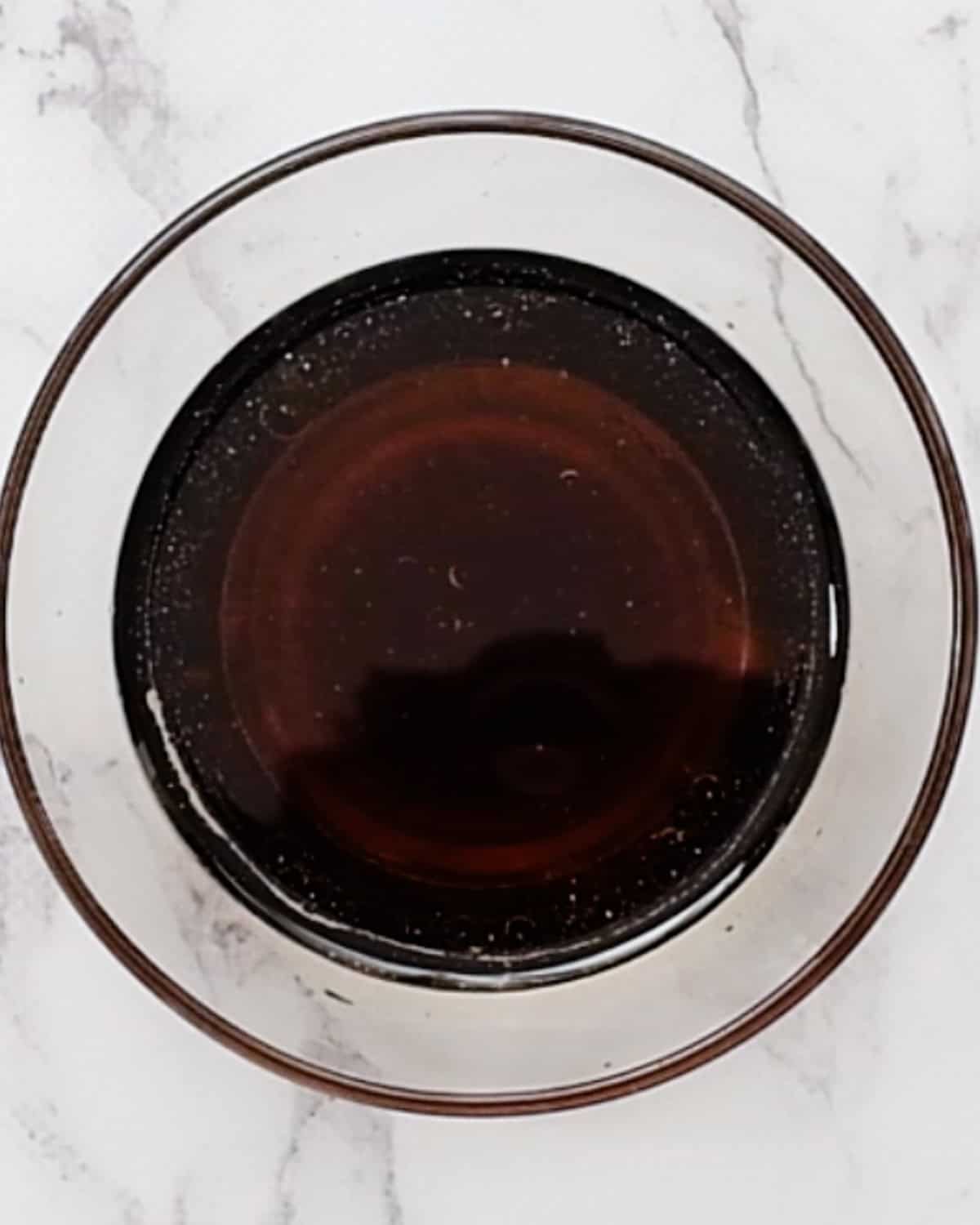 How to Make Homemade Granola - wet ingredients in a small bowl