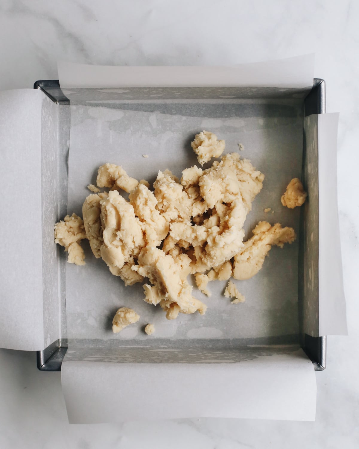 How to Make Lemon Bars - dough in the baking pan