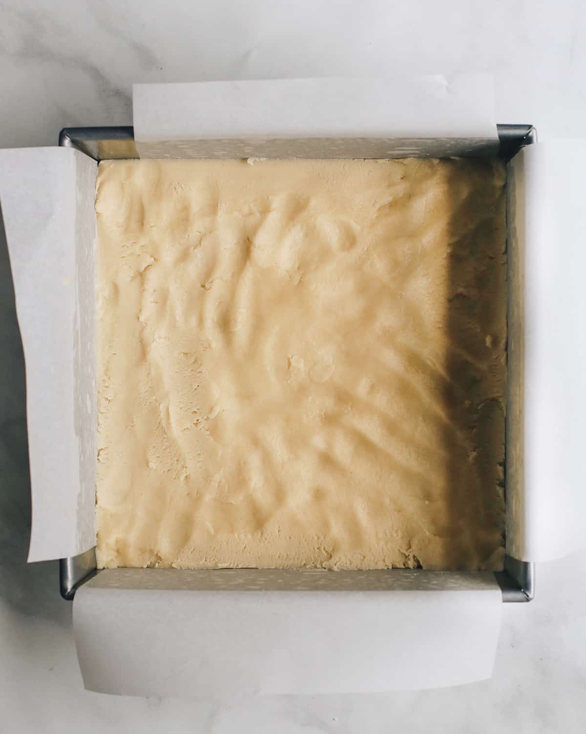How to Make Lemon Bars forming the shortbread crust