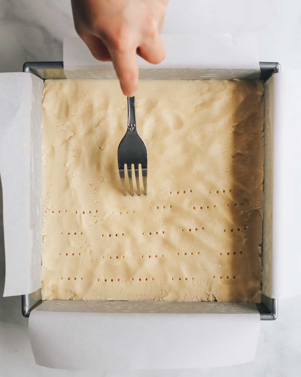 How to Make Lemon Bars forming the shortbread crust