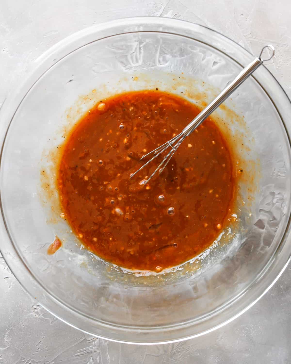 How to Make Meatloaf wet mixture in a glass bowl with a whisk after whisking