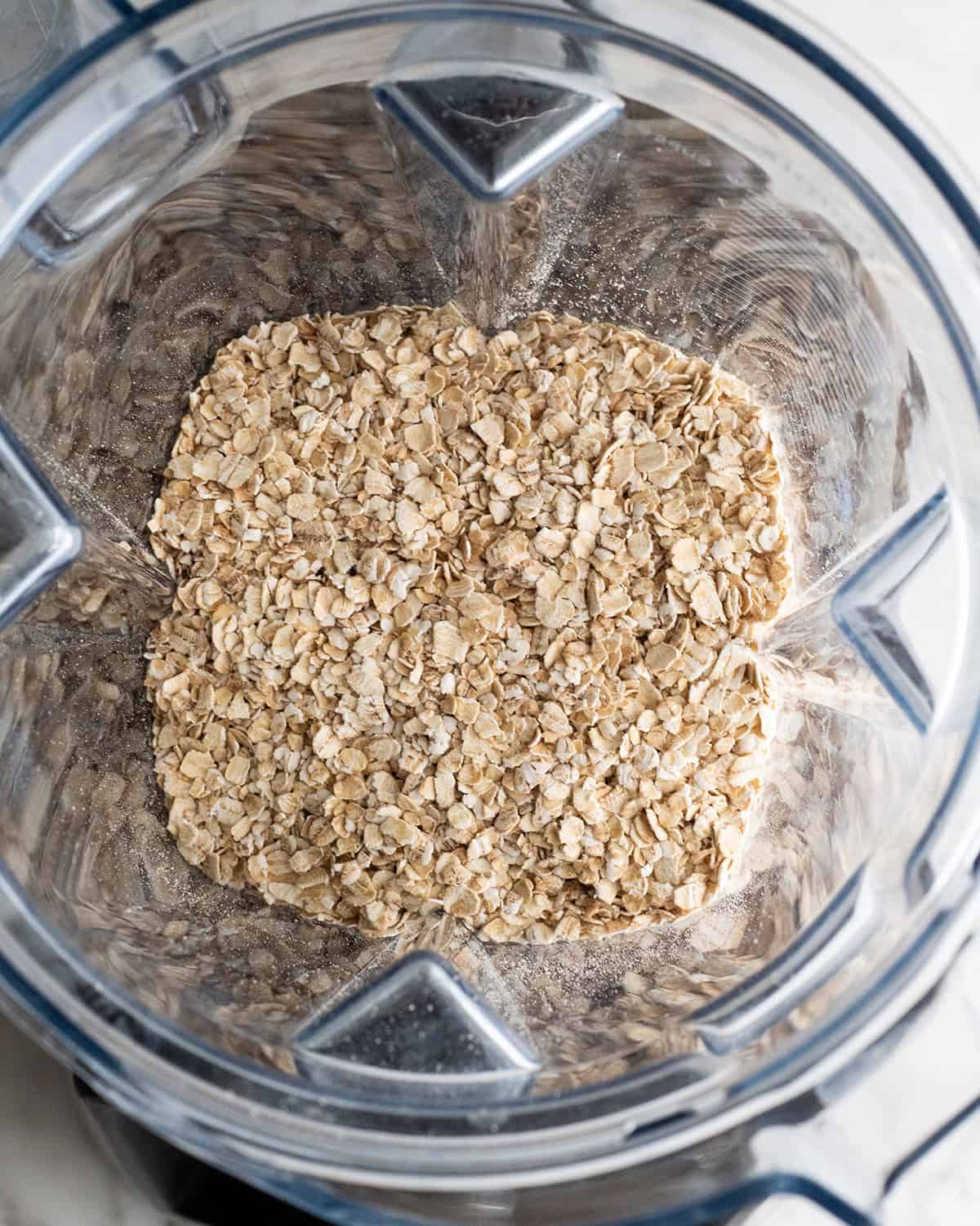 How to Make Oat Flour - oats in a blending container before blending