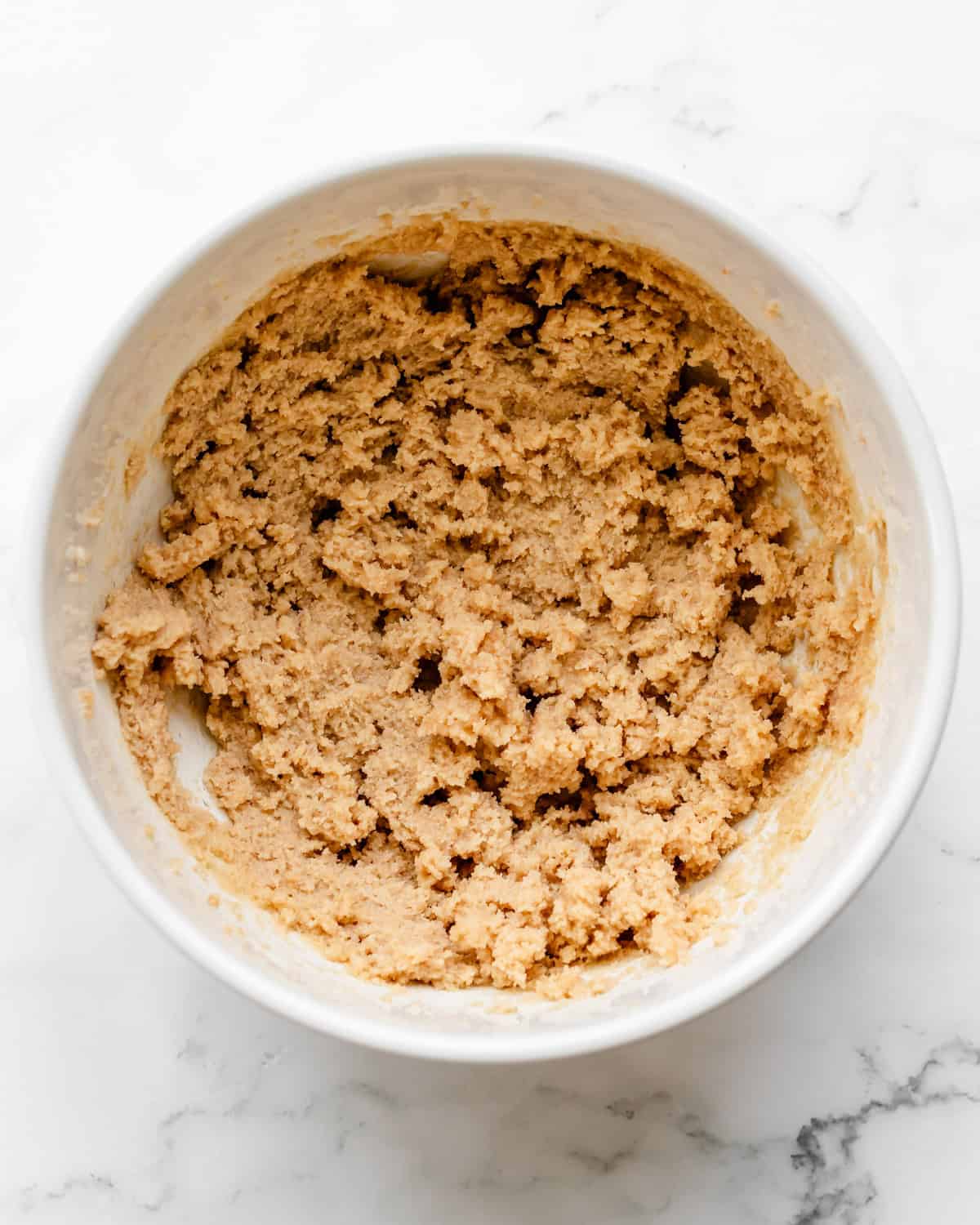 How to Make Oat Flour Cookies - mixture after beating butter and sugars together in a bowl