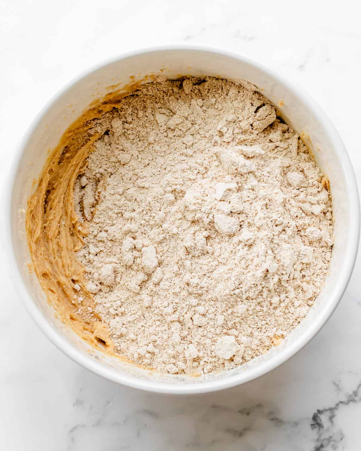 How to Make Oat Flour Cookies - dry ingredients added to wet ingredients before beating