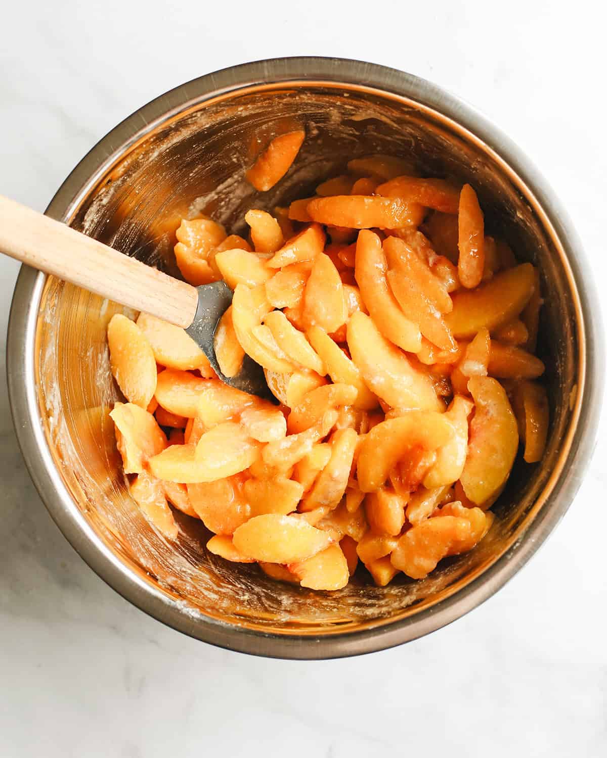 photo showing how to make How to Make Peach Pie filling - after ingredients are mixed