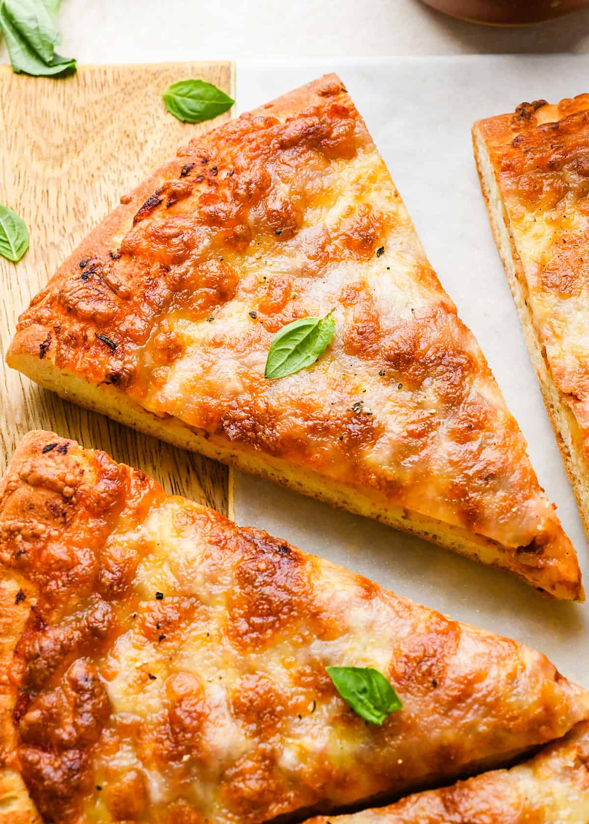 a triangular slice of homemade Pizza