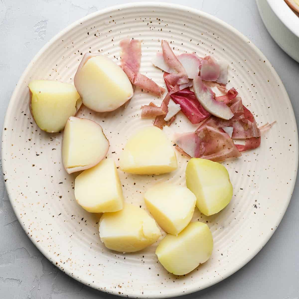 peeling potatoes for potato salad