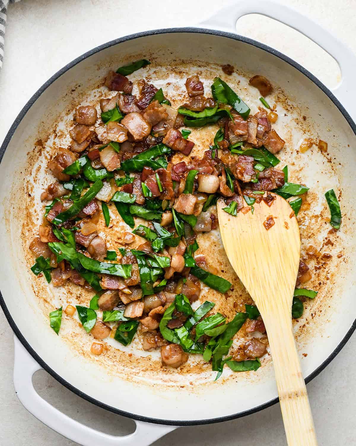 spinach after being cooked to make bacon spinach quiche